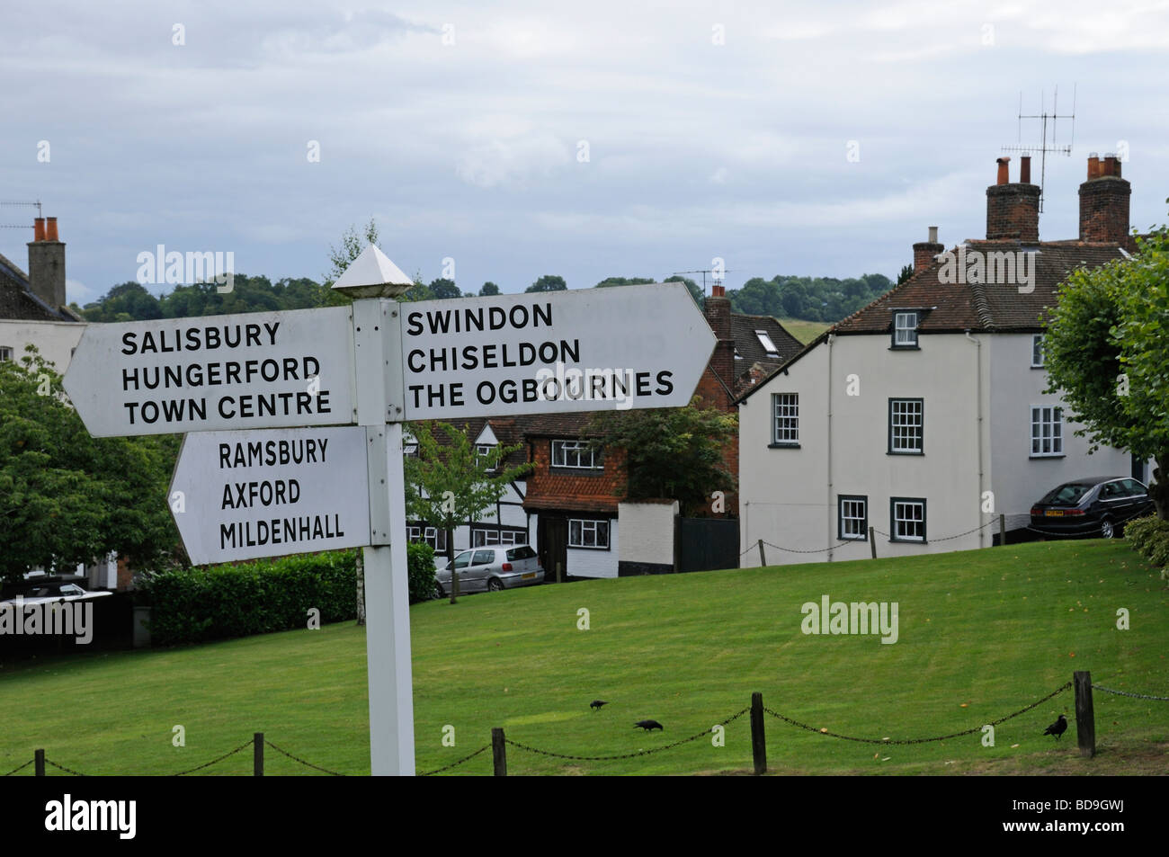 Signposts By The Village Green In Marlborough, Wiltshire, England, UK Stock Photo