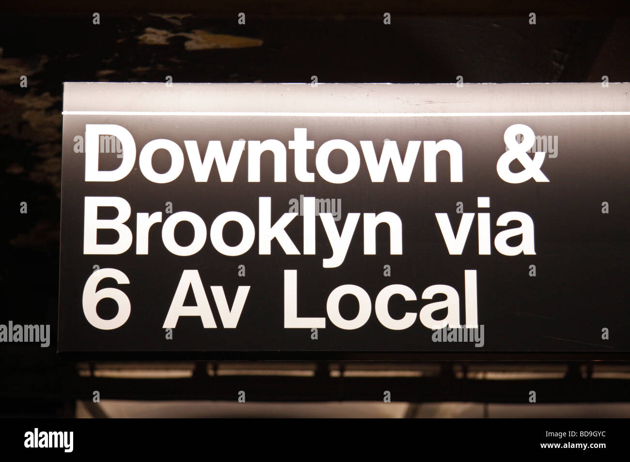 Downtown & Brooklyn sign for Line 6 inside a New York Subway station, United States. Stock Photo