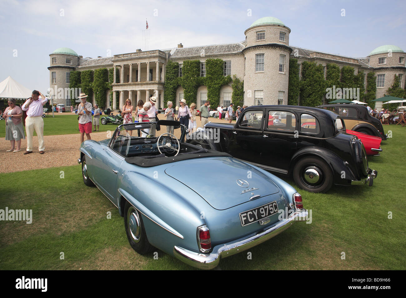 classic vintage cars parked in front of Goodwood House, West Sussex, England, UK Stock Photo