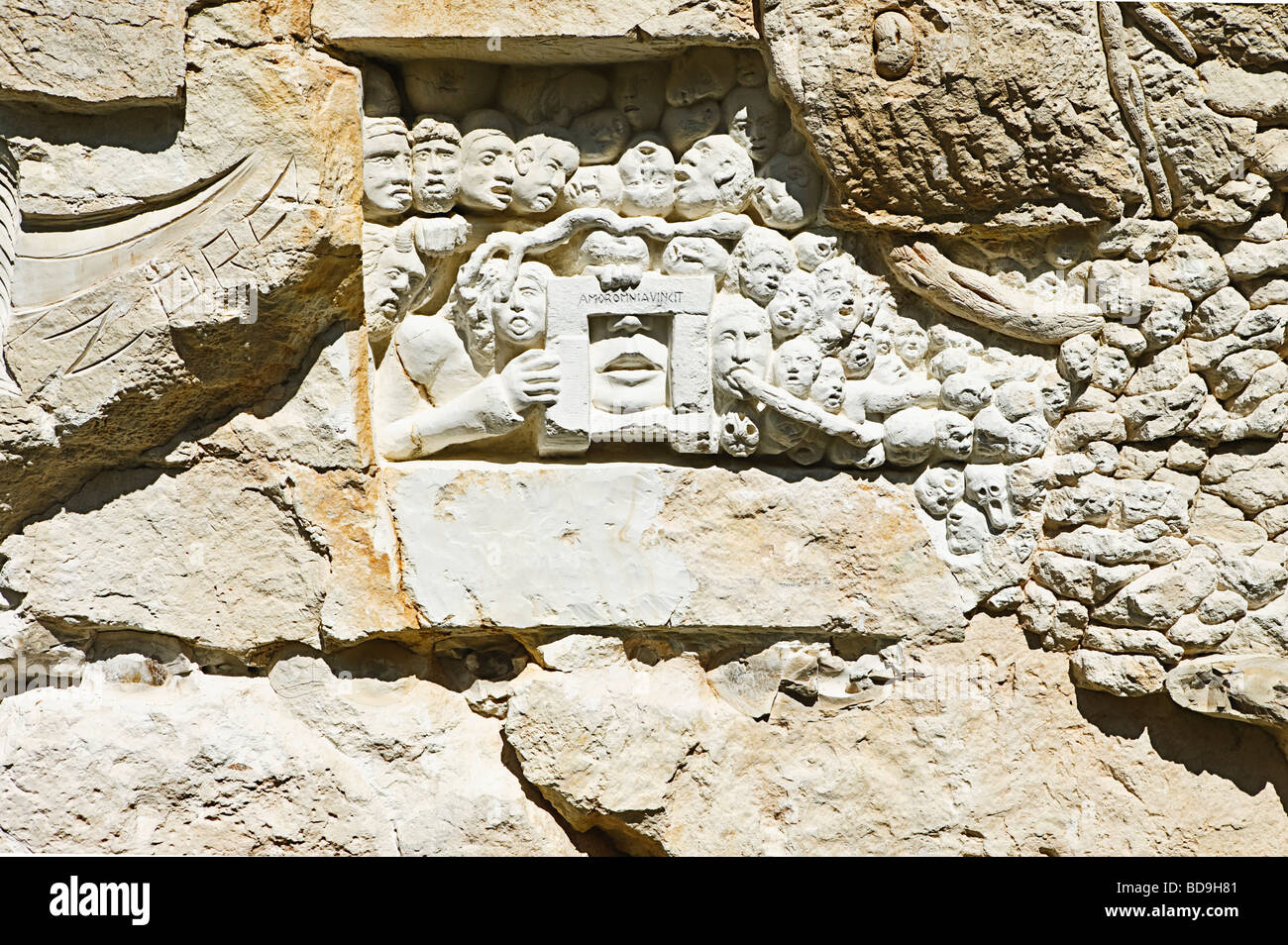 high relief sculpture symbolizing death in a Grazannes stone quarry by [Gerard Pellini][memorial to the dead for no reason] Stock Photo