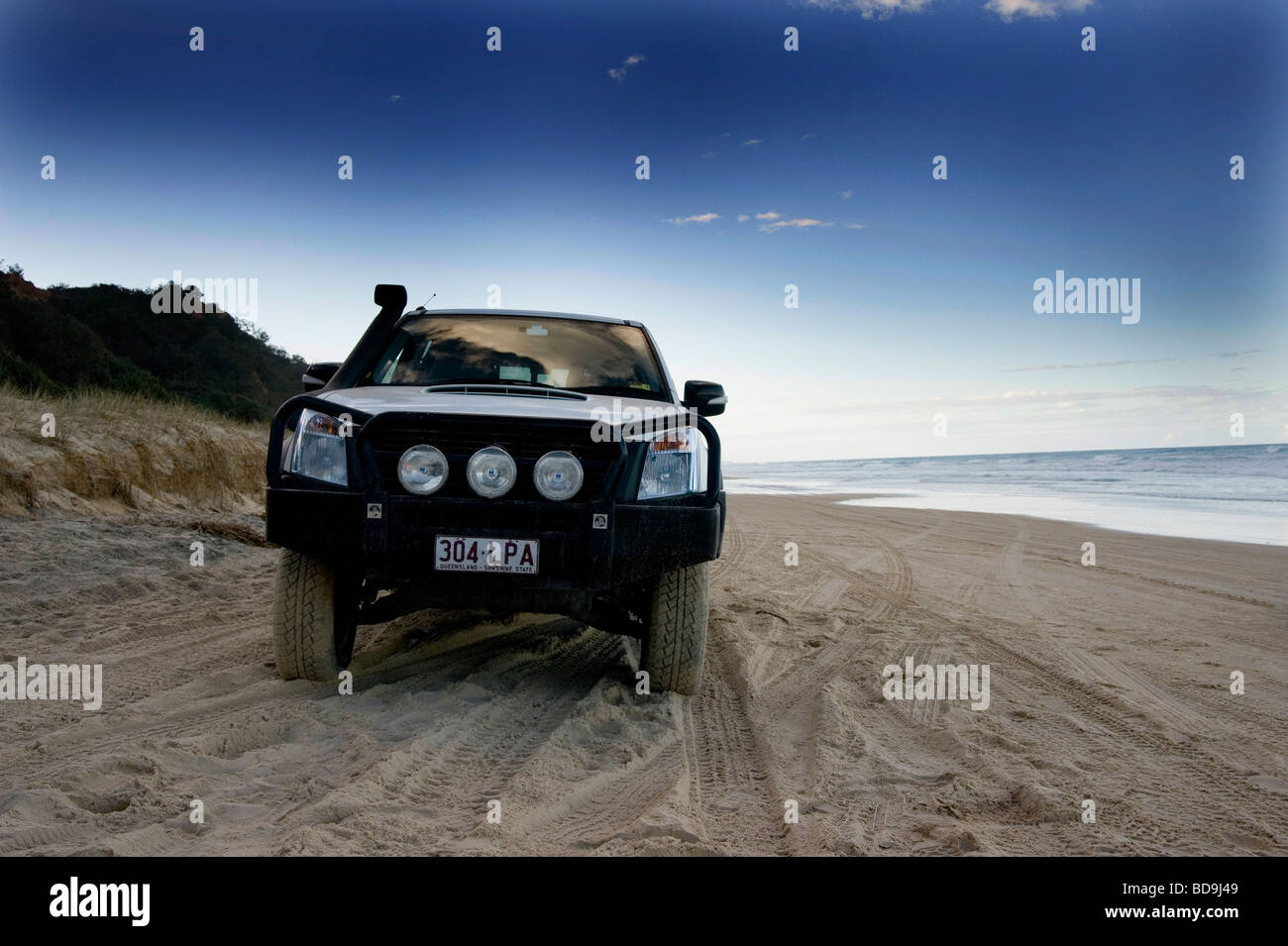 4 Wheel drive on Rainbow beach Queensland Australia Stock Photo