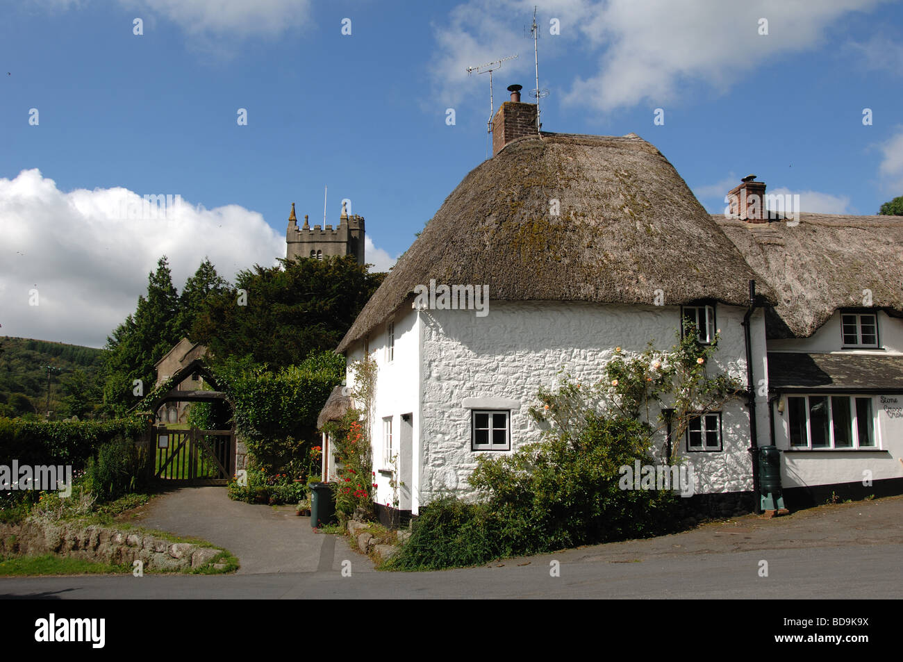 Thatched cottage and church in North Bovey Village dartmoor national
