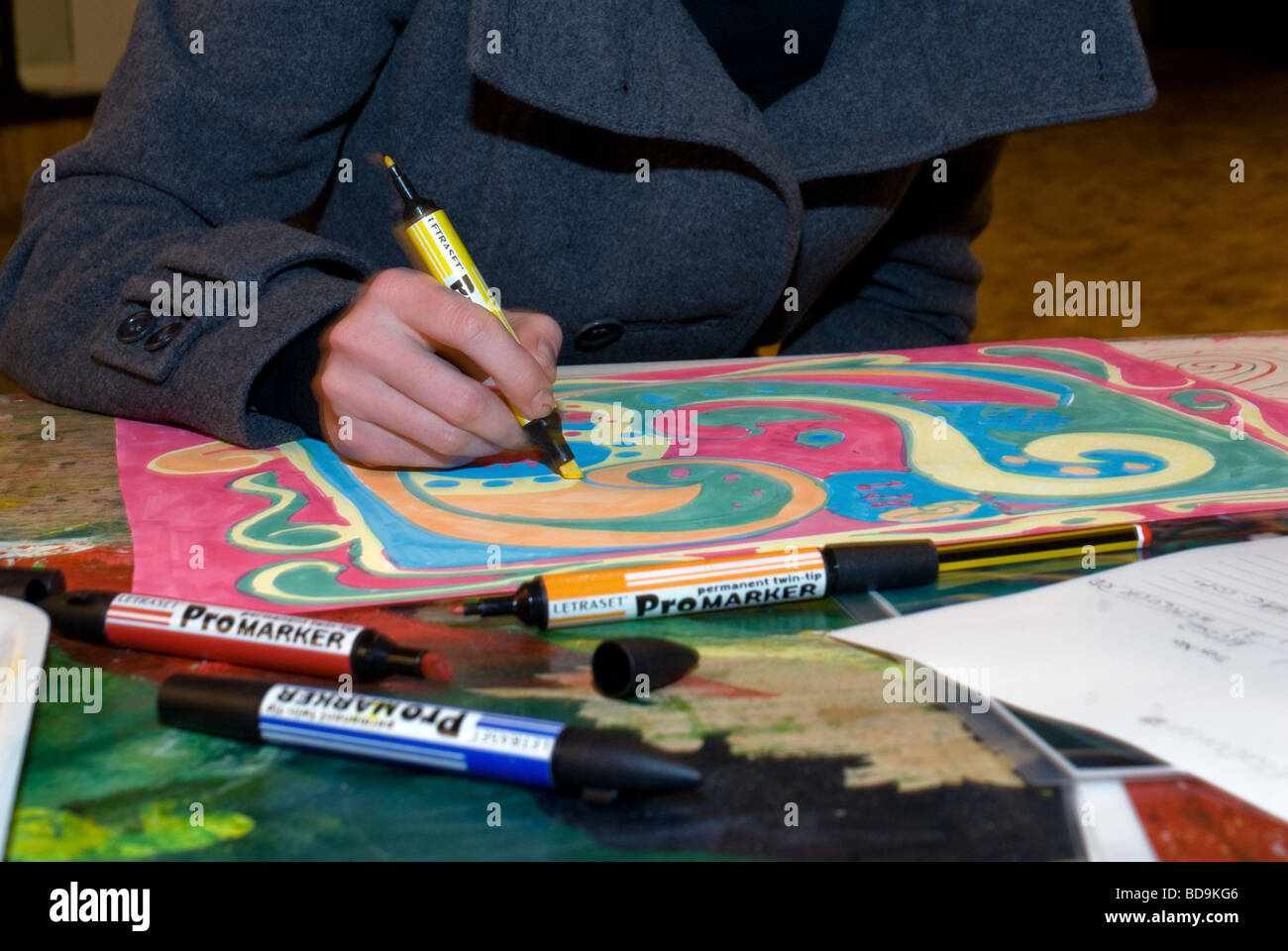 Drawing with coloured crayons Stock Photo Alamy