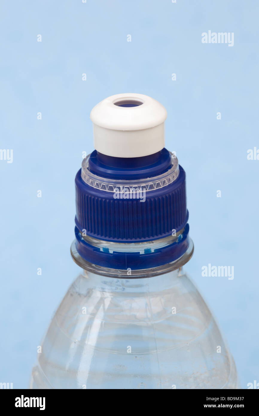 Single use plastic bottle of pure still mineral water with drinking top in close up Stock Photo