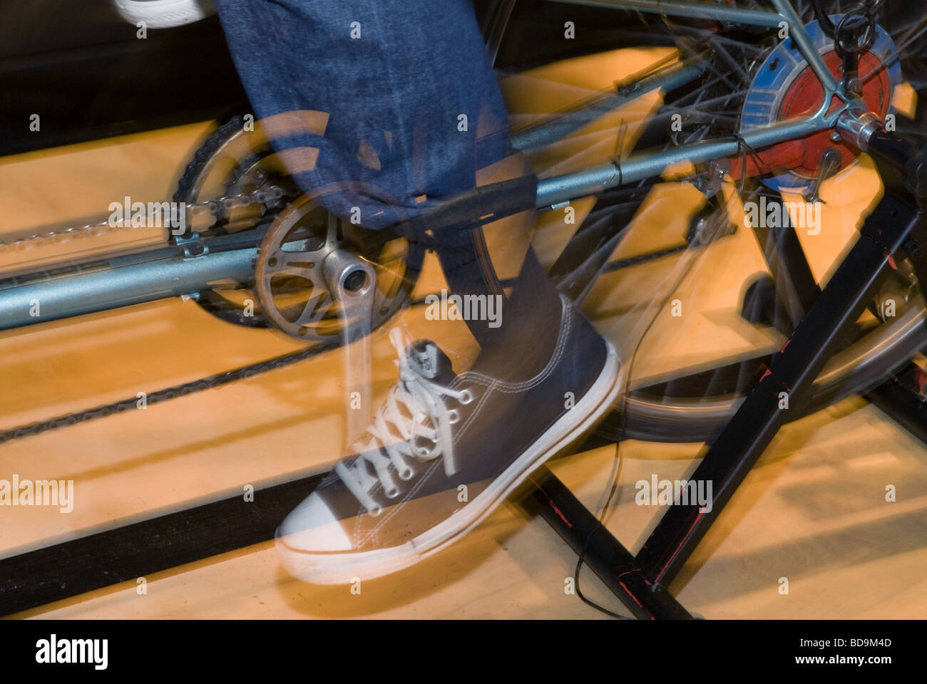 Close up of feet on bicycle pedals Stock Photo Alamy