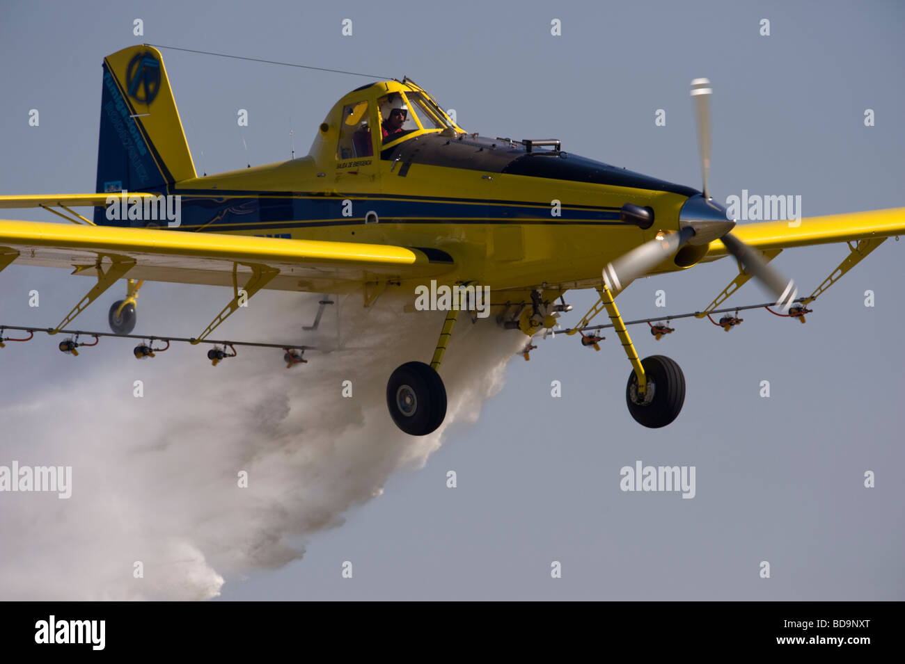 A cropduster spraying pesticide Stock Photo