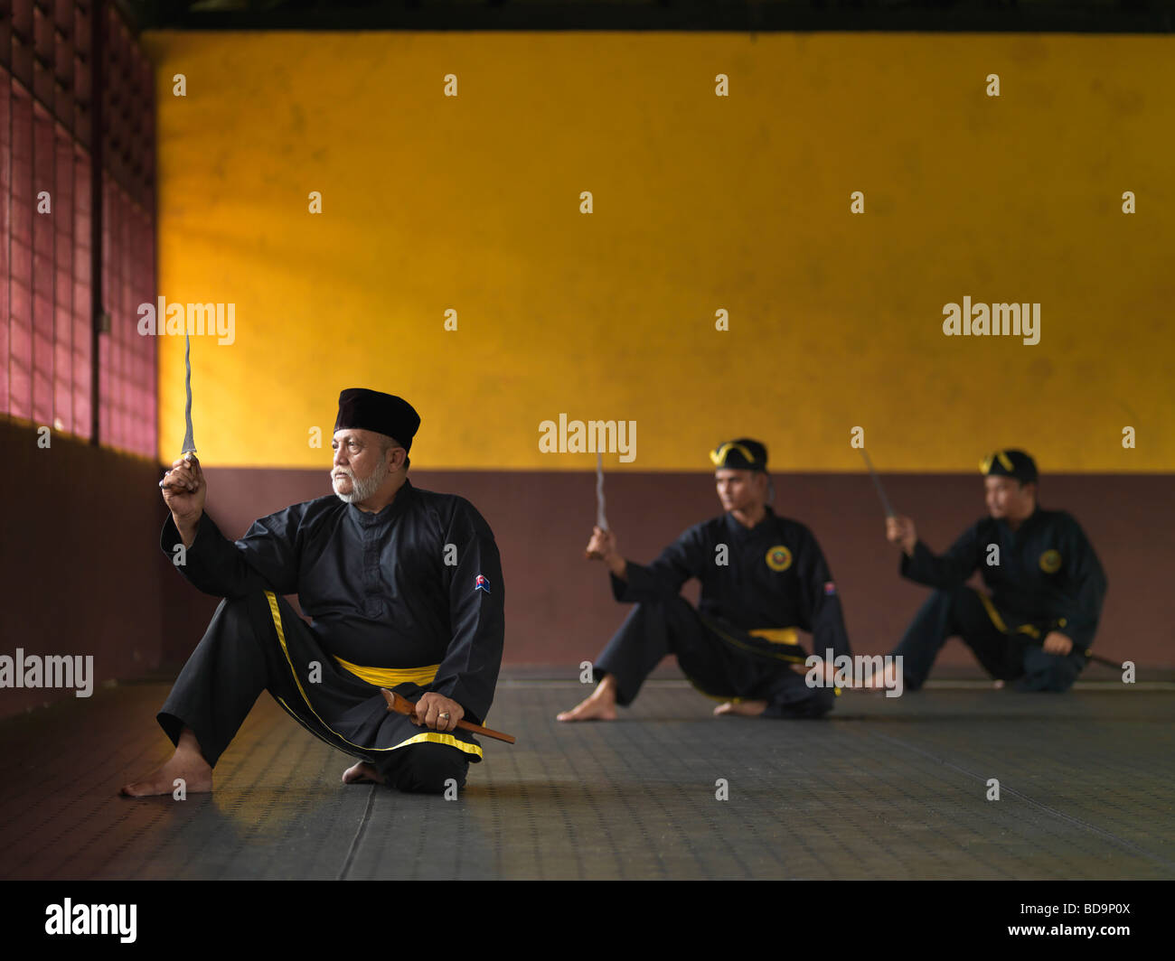 A Silat Master preforming the Malaysian Martial Art of Silat. Stock Photo