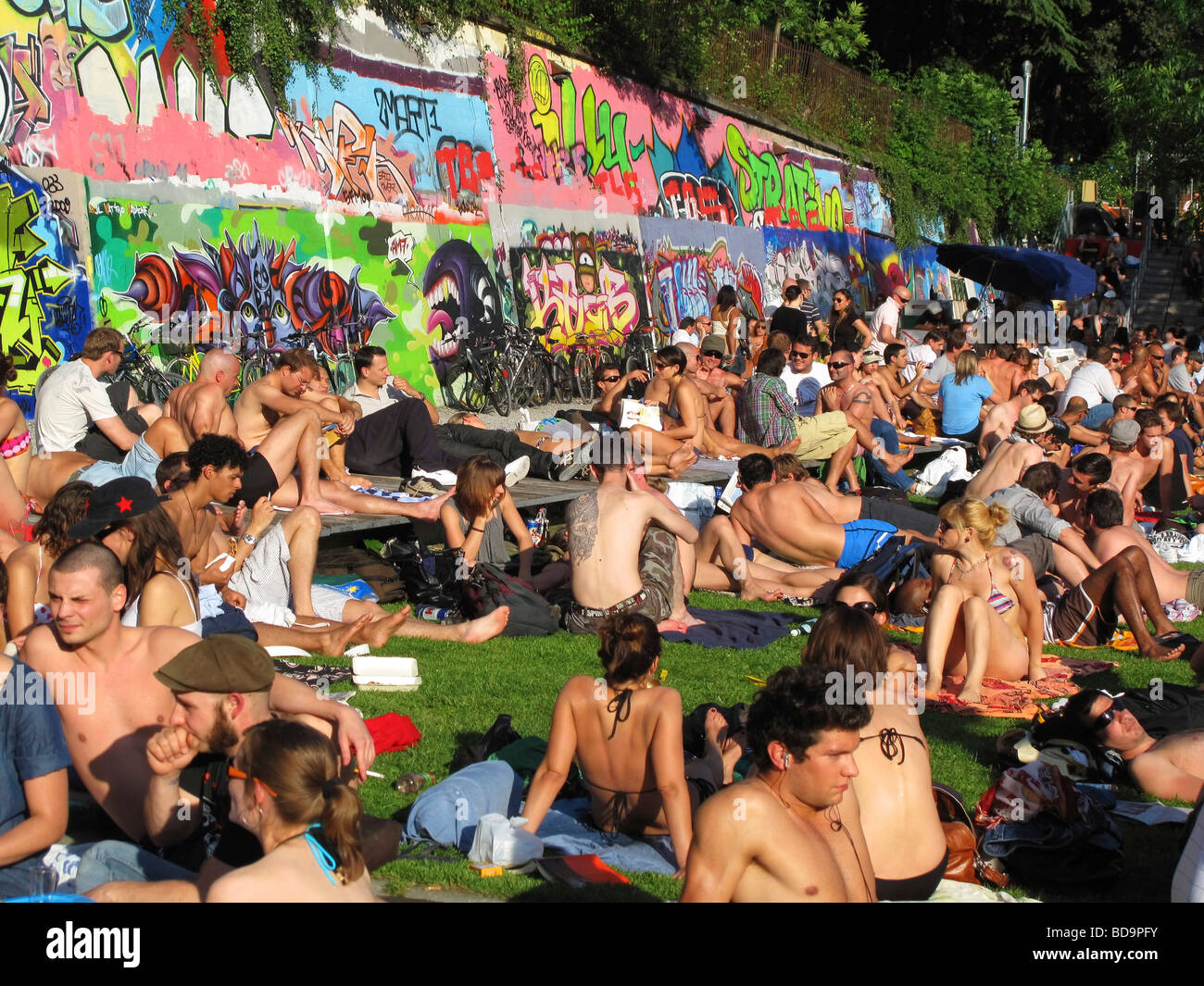 Letten at river Limmat people sunbathing Zurich Switzerland Stock Photo