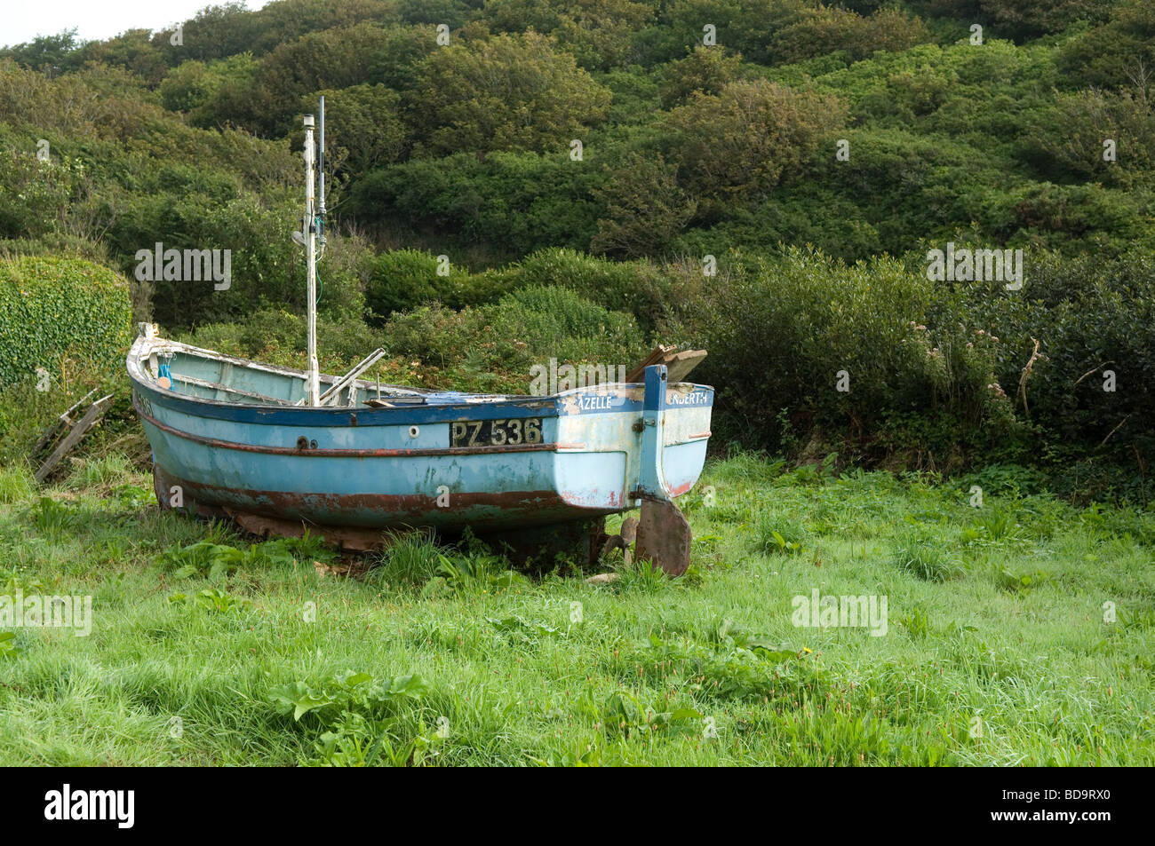 Abandoned lobster boat above Penberth Cove in Cornwall, UK Stock Photo