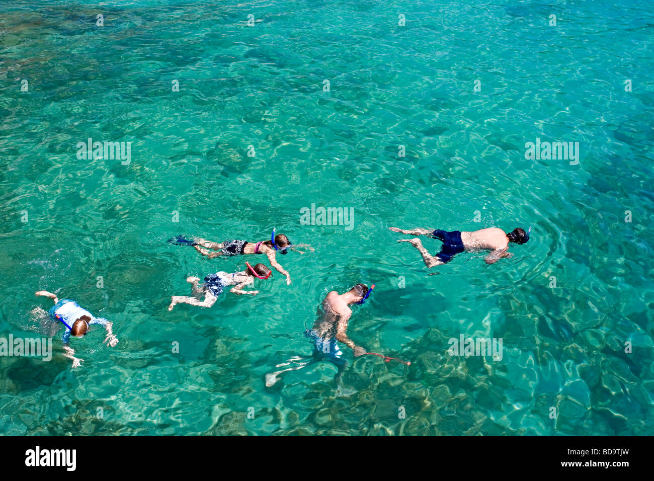 Family snorkeling. Cala Santanyi. Mallorca Island. Spain Stock Photo
