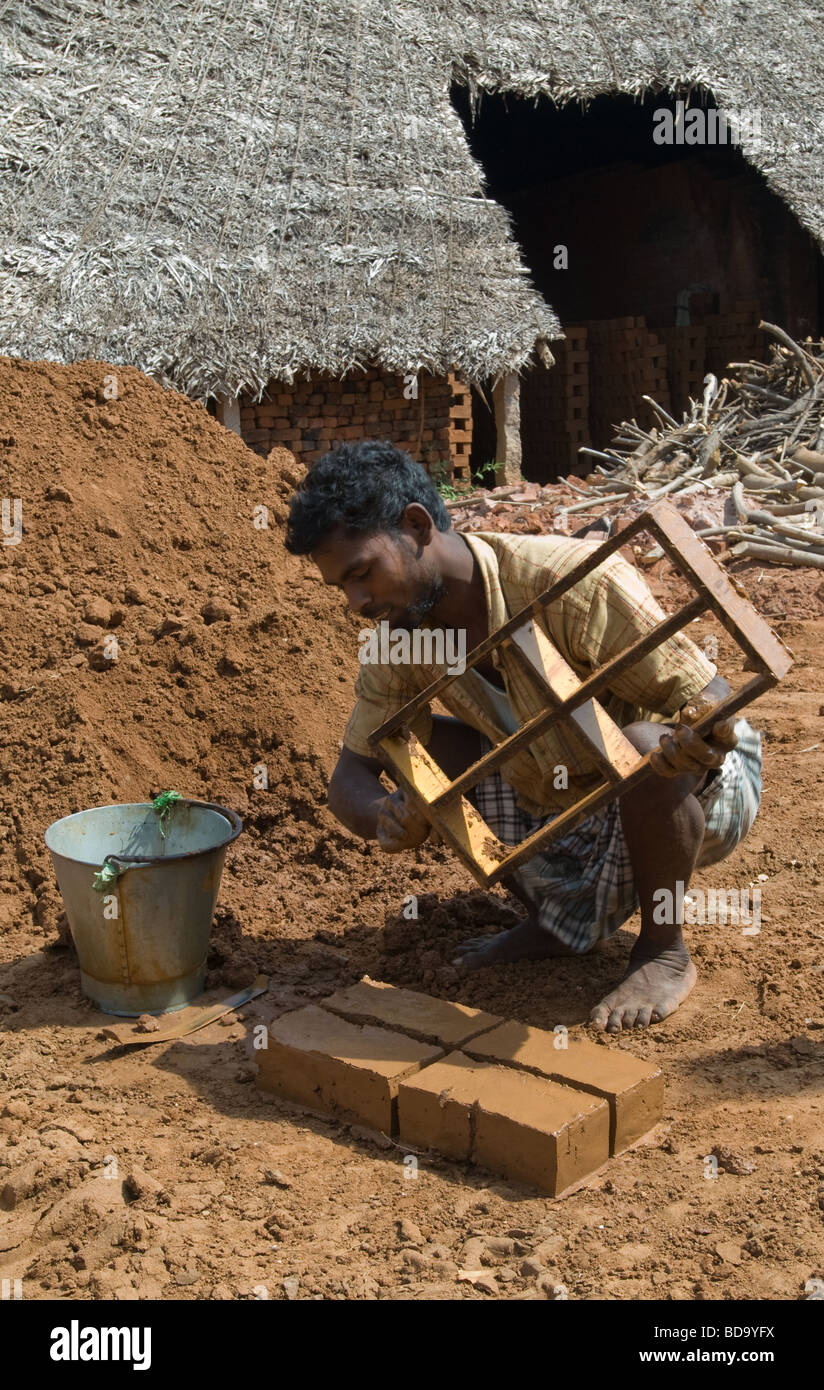 Man making bricks in Maharashtra, India Stock Photo