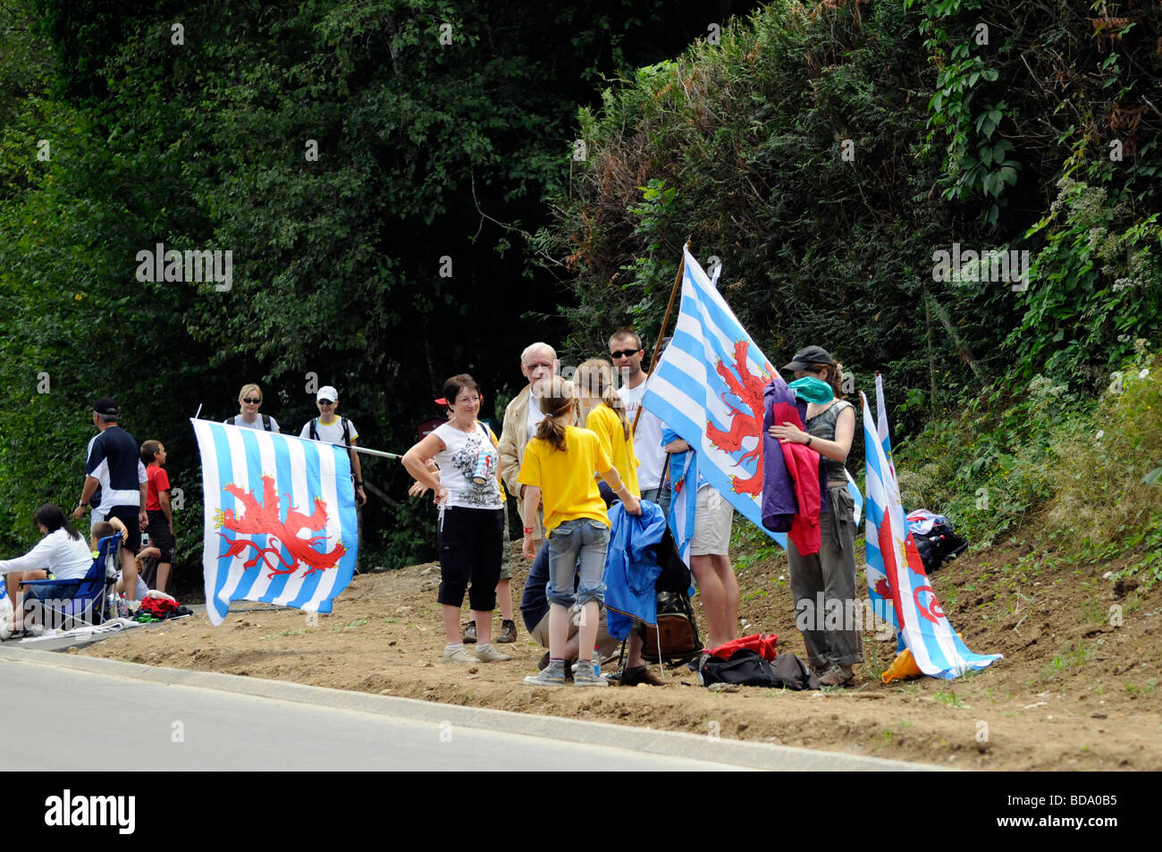 Andy Schleck supporters, carrying Luxembourg flags. Tour de France 2009 Lac Annecy Time Trial Stock Photo