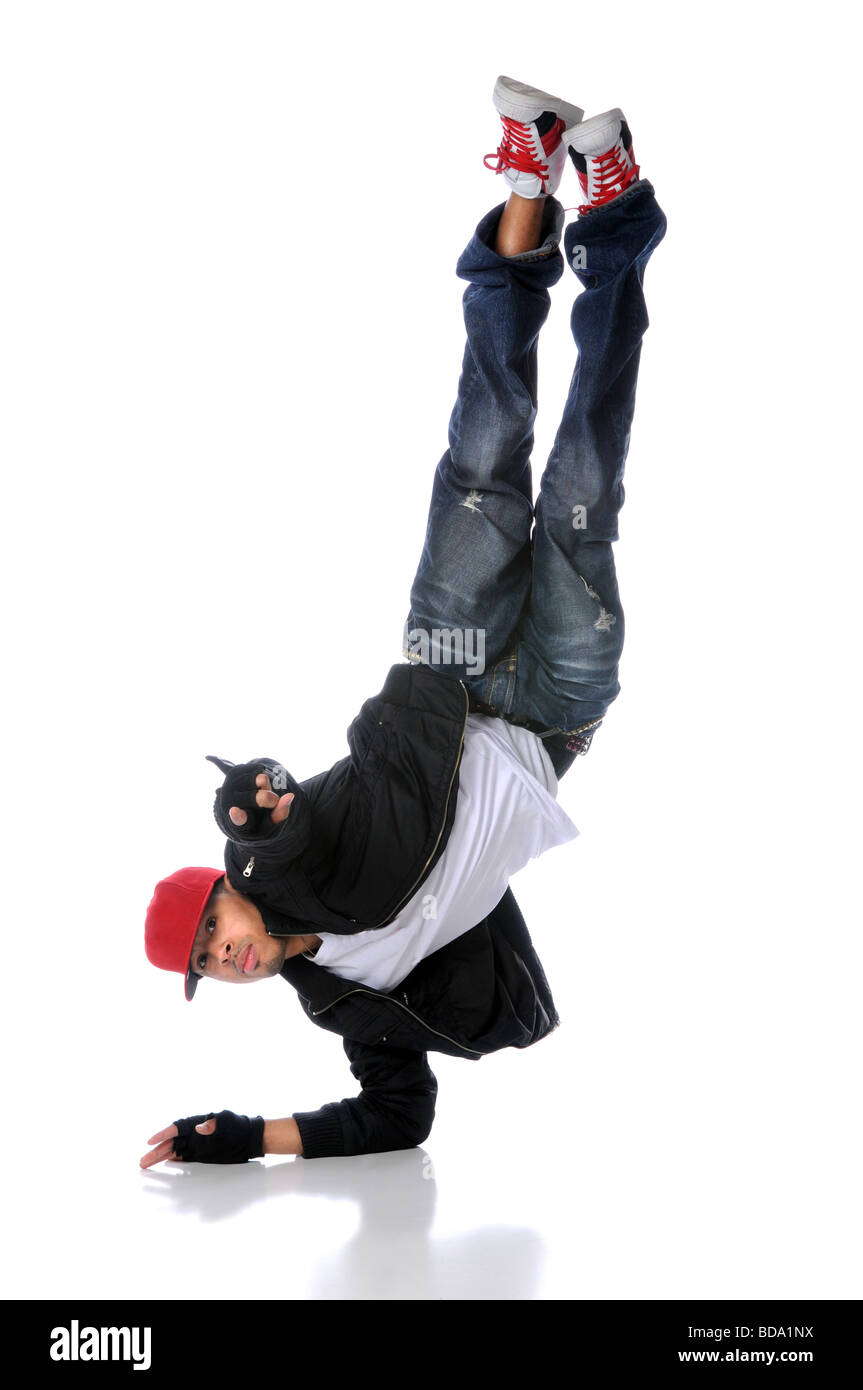 African American hip hop dancer standing on one arm Stock Photo