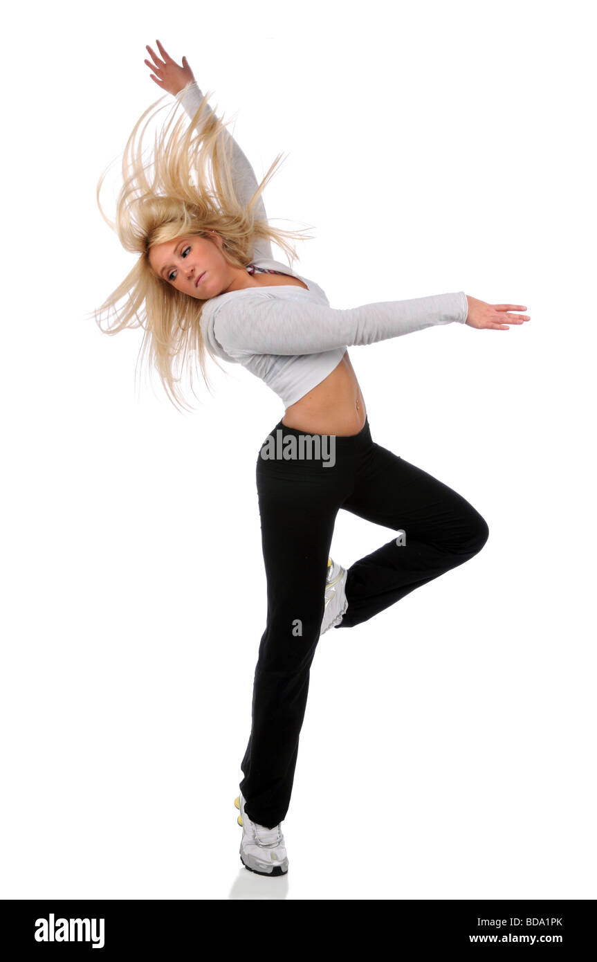 Young blond woman dancing over white background Stock Photo - Alamy