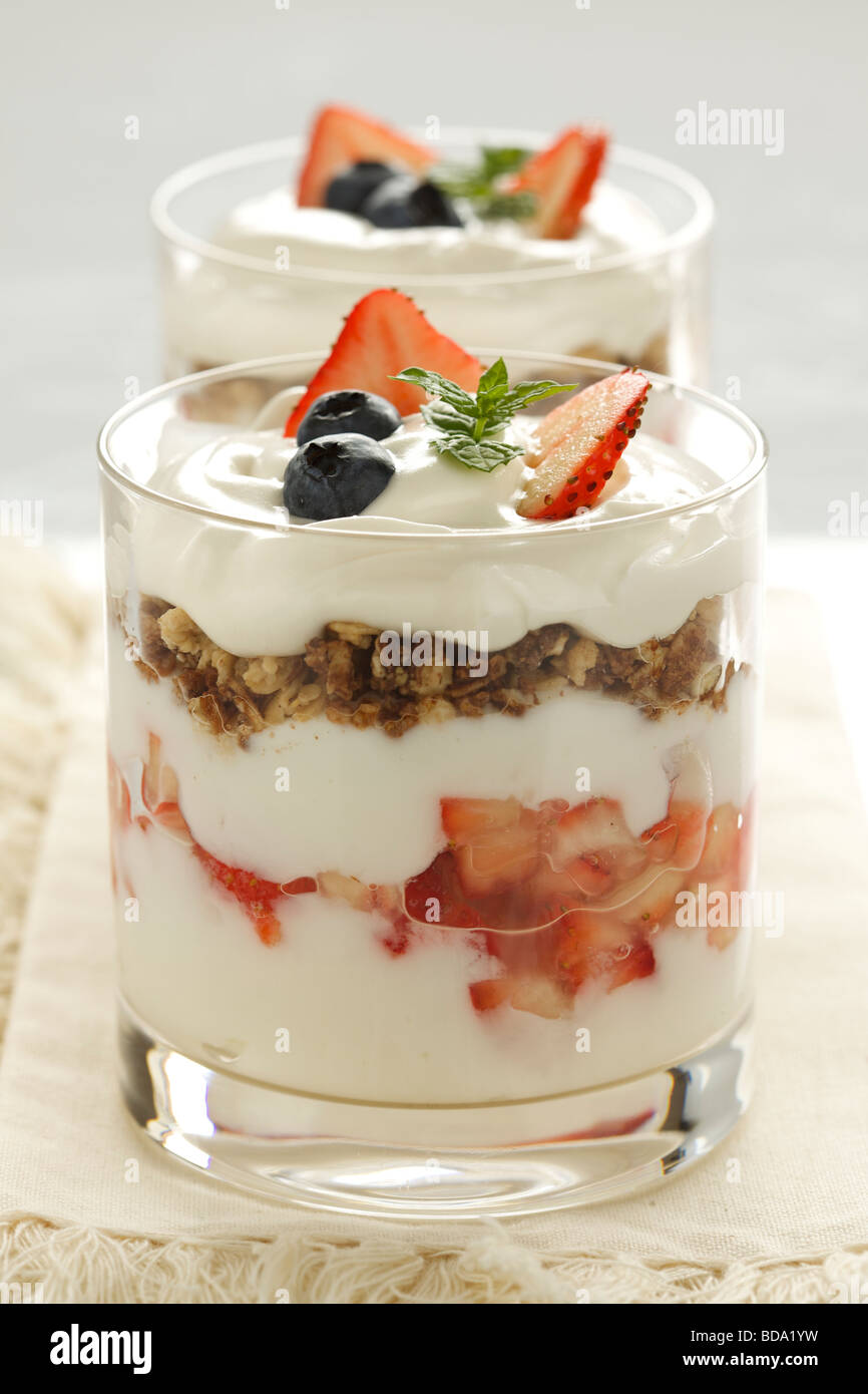 Strawberry yogurt parfait with granola in a glass Stock Photo Alamy