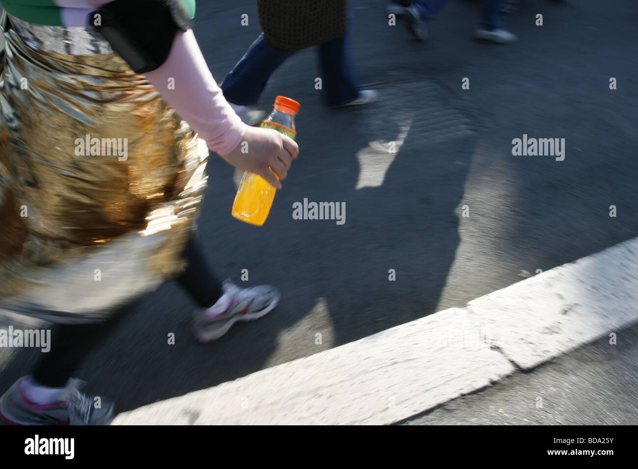 female marathon runner with bottle of energy drink Stock Photo Alamy