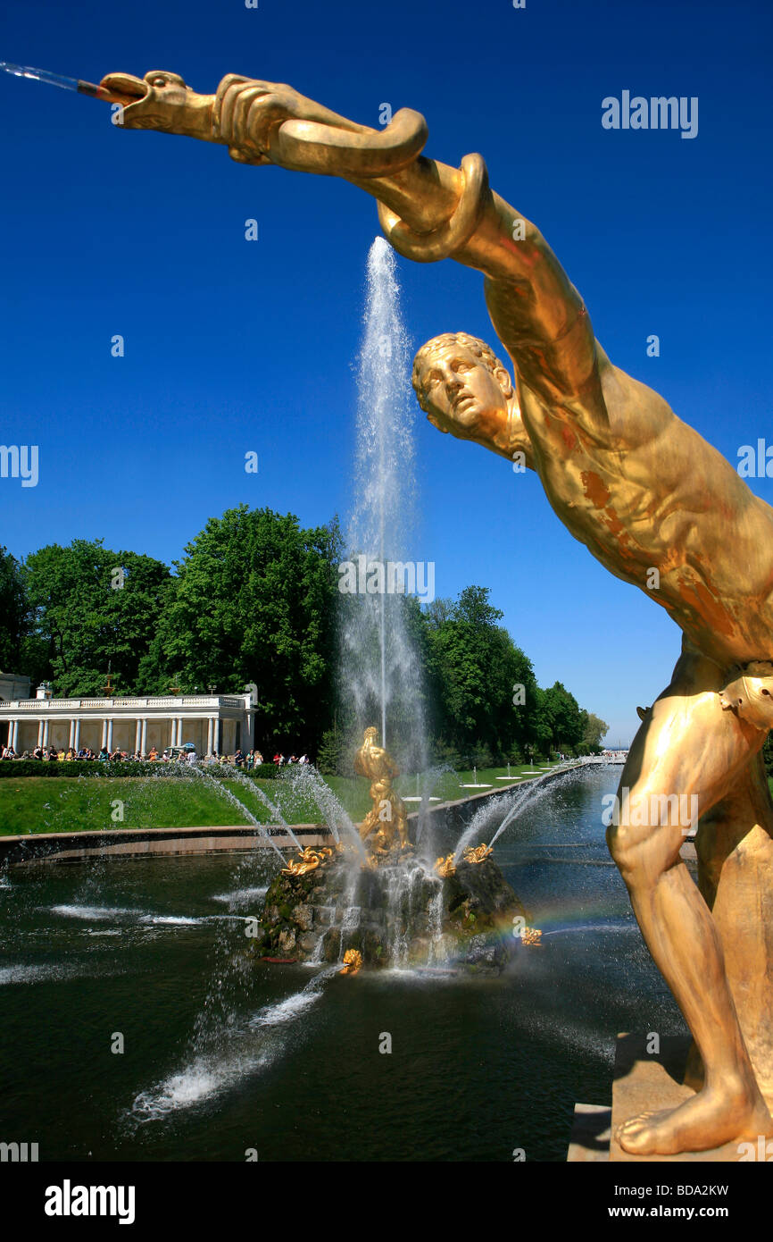 Gilded statue of Apollo holding the snake Python at the Grand Cascade ...