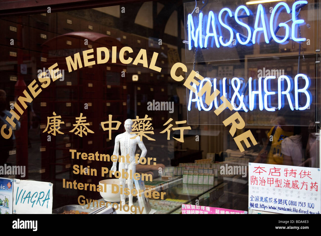Window of a Chinese herbal medicine shop. Chinatown, London Stock Photo