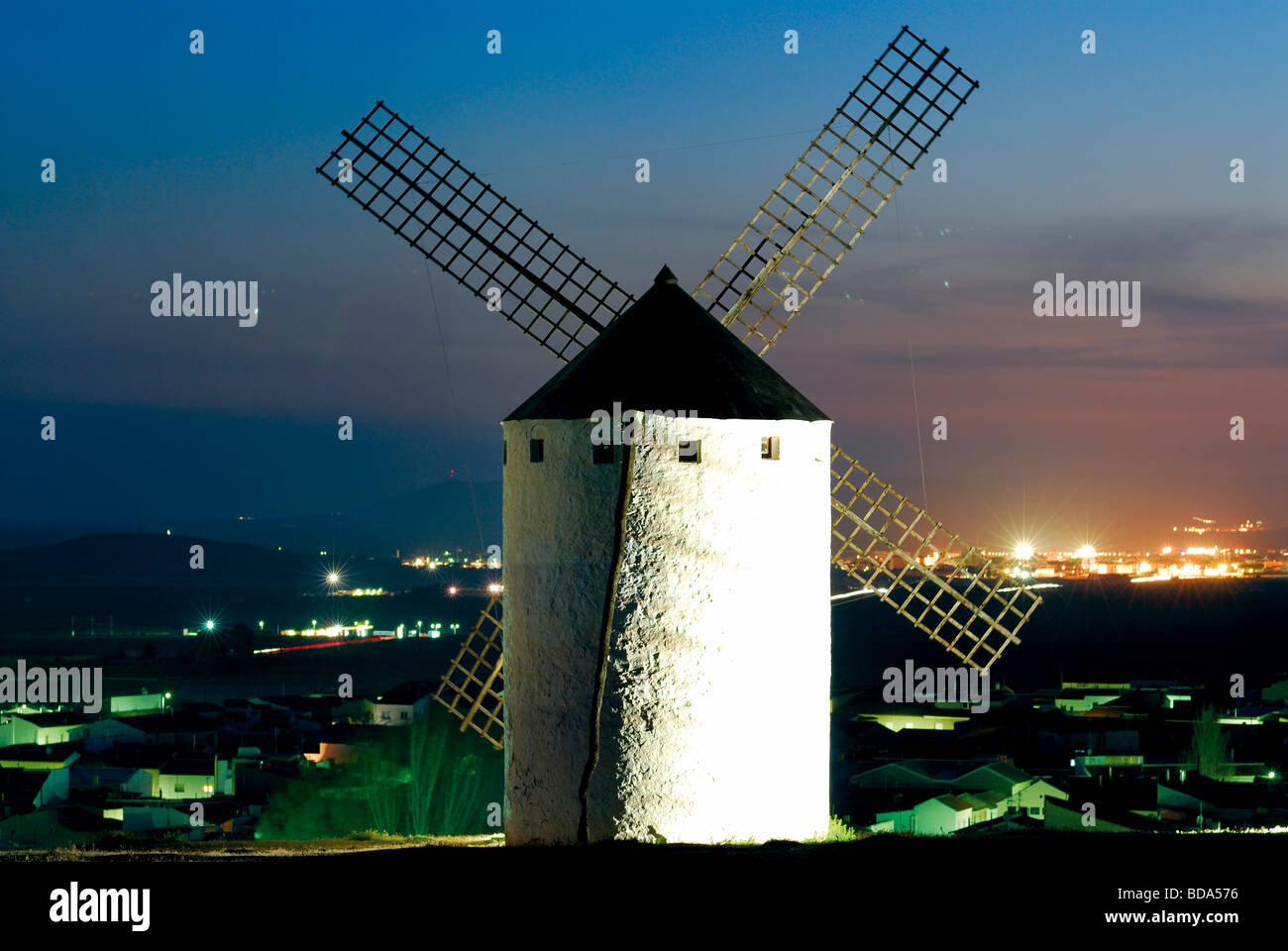 Spain, Castilla- La Mancha: Nocturnal view of windmills Stock Photo