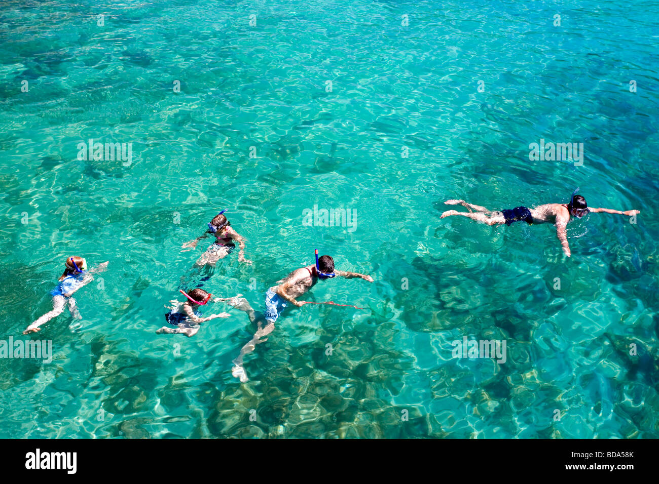 Family snorkeling. Cala Santanyi. Mallorca Island. Spain Stock Photo