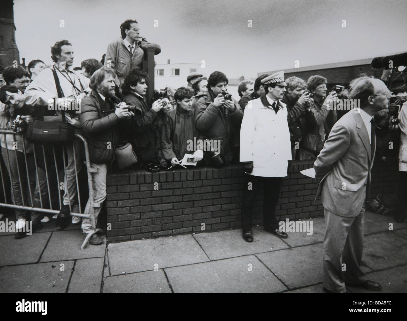 Journalists and photographers await the visit of Margaret Thatcher to Lockerbie in 1988, the day after the bombing Stock Photo