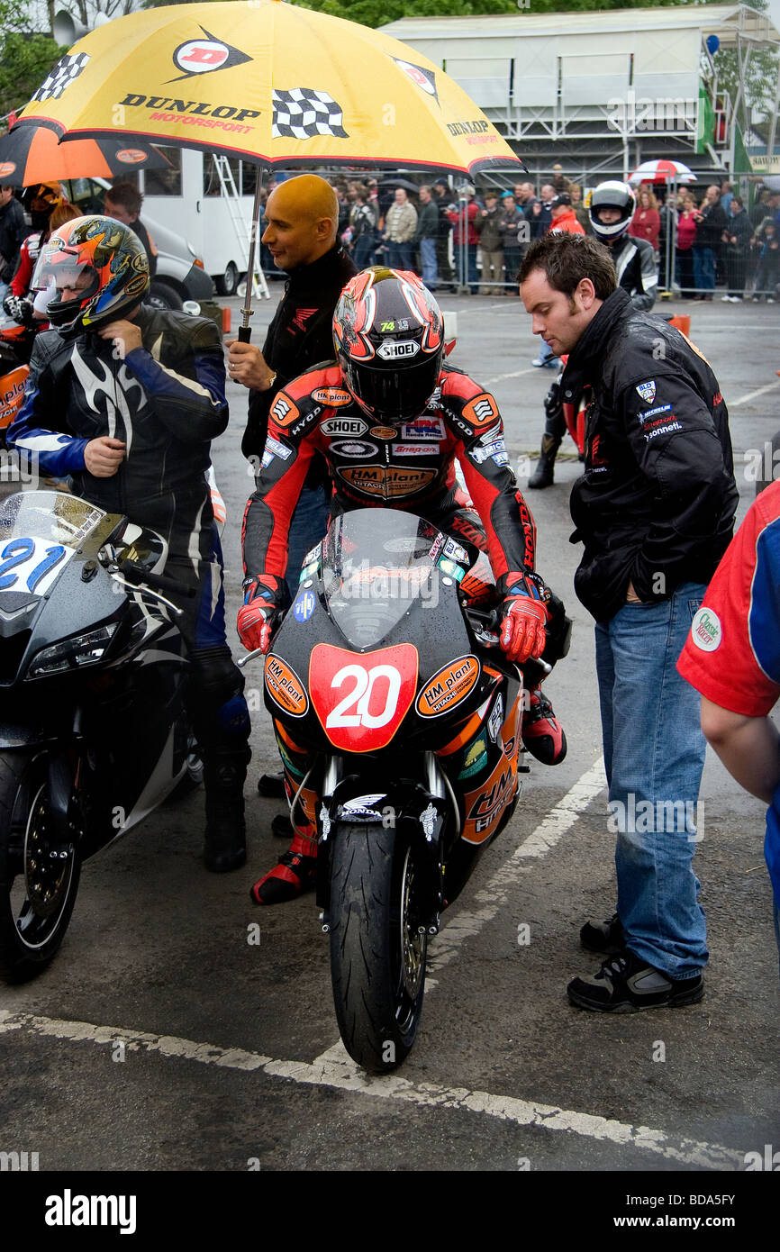 Ryuichi Kiyonari sits on his HM Plant Honda waiting for his turn to race in  the wet at the Northwich Thundersprint Stock Photo - Alamy