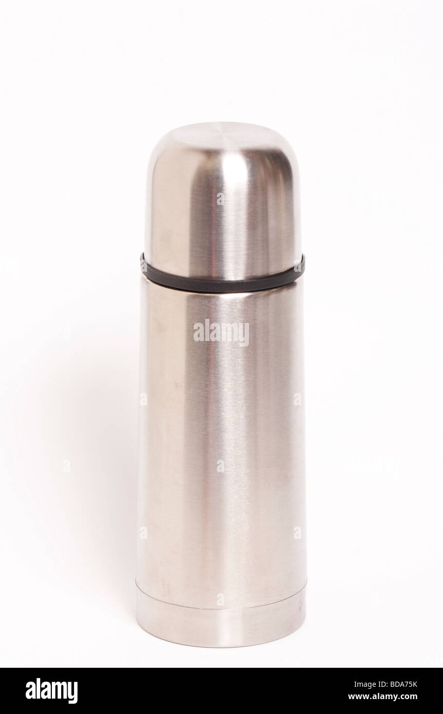 A close up of a stainlesss steel flask on a white background Stock Photo