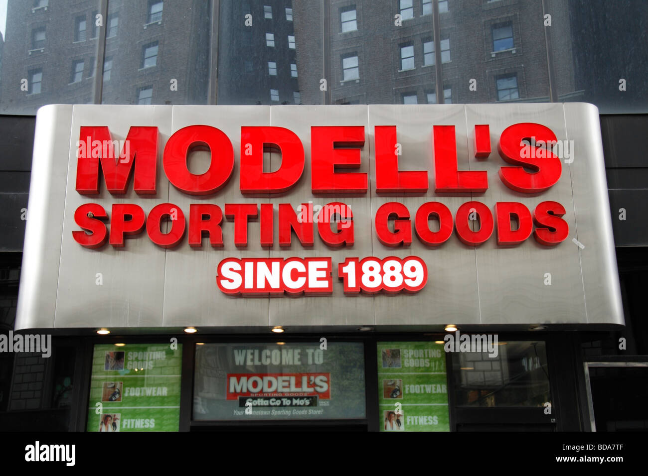 The sign above the store front of the Modell's Sporting Goods Broadway New York, United States. Stock Photo