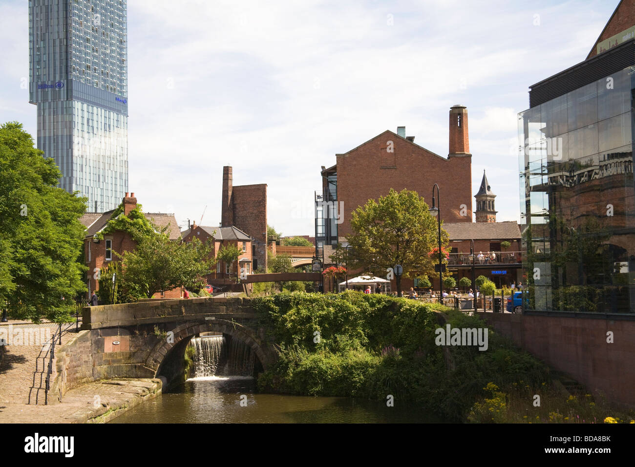 Manchester England UK Castle street bridge over the canal in the redeveloped Castlefield Urban Heritage Park Stock Photo