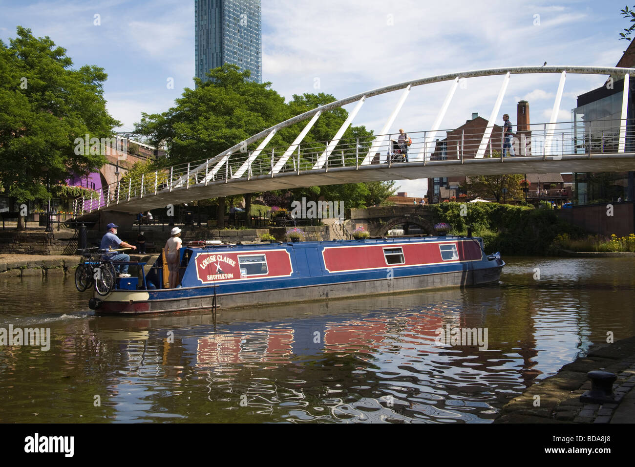 Manchester England UK Narrowboat on a canal in the redeveloped Castlefield Urban Heritage Park the world's first urban heritage park  1982 Stock Photo