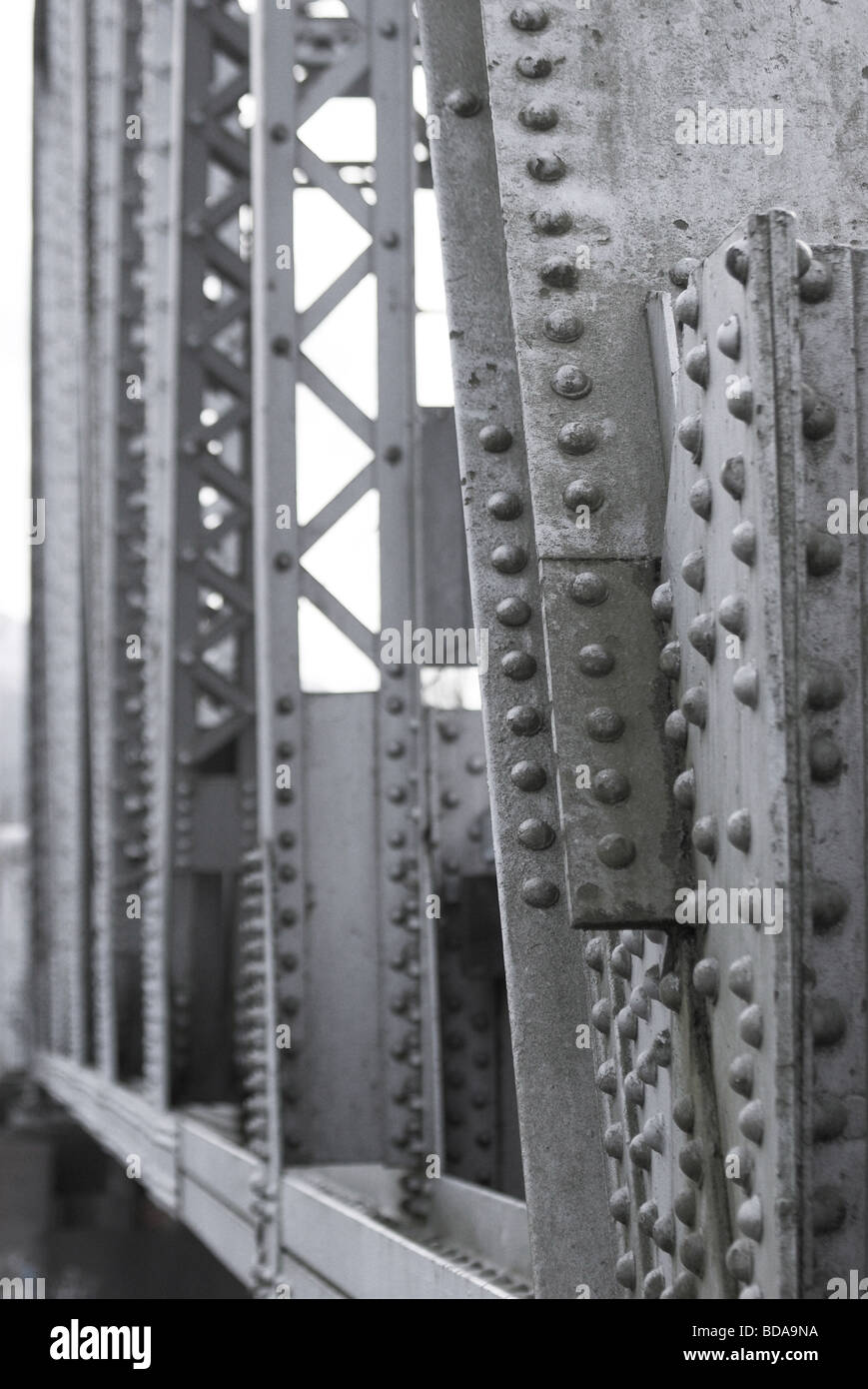 Closeup of steel rivets and spans of rail bridge Stock Photo Alamy