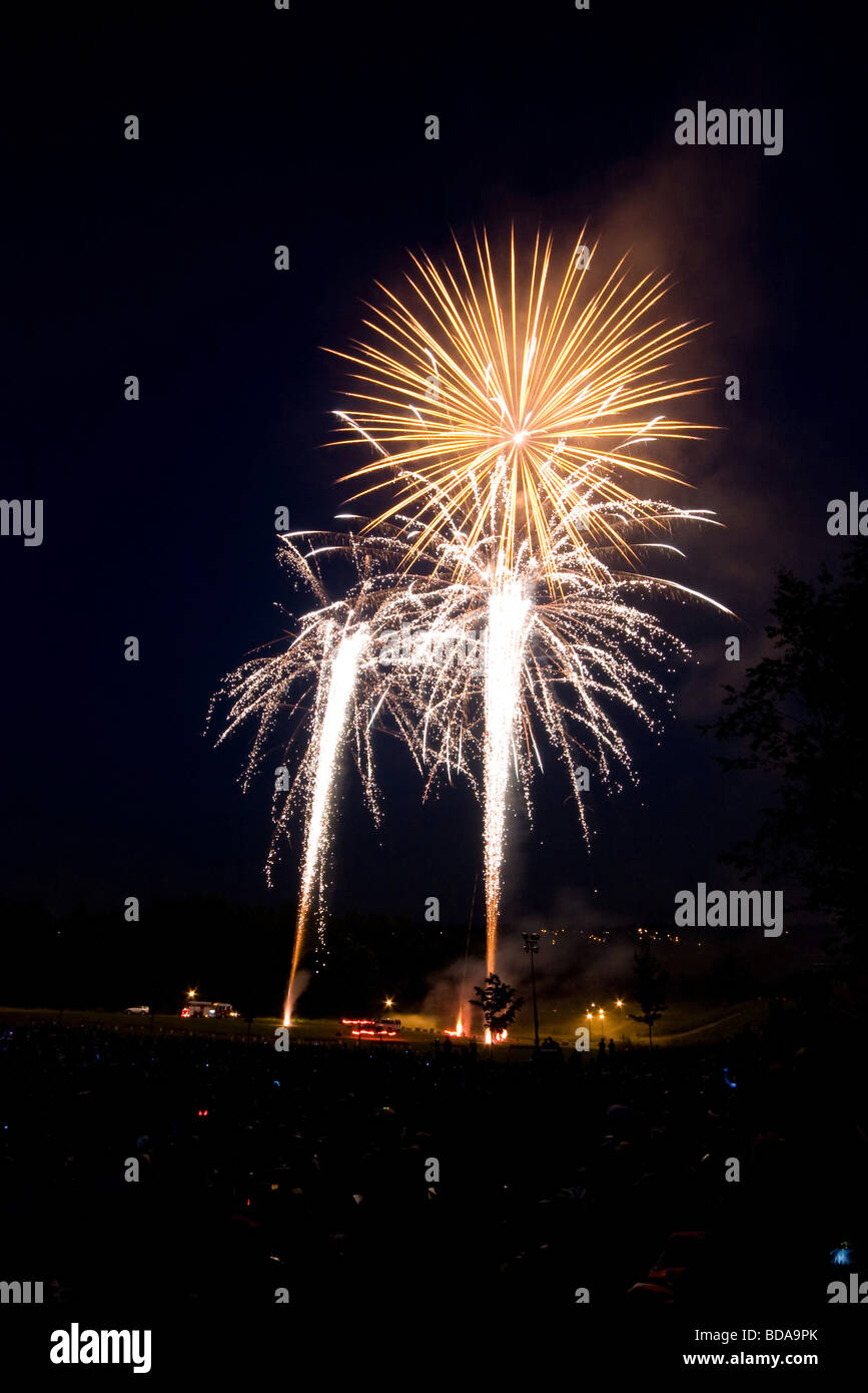 Fireworks explode over crowd gathered for Canada Day, July 1 Stock Photo