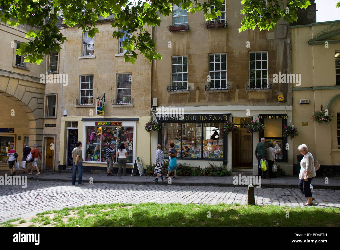 Street scene with shops in city centre Bath Somerset England Stock