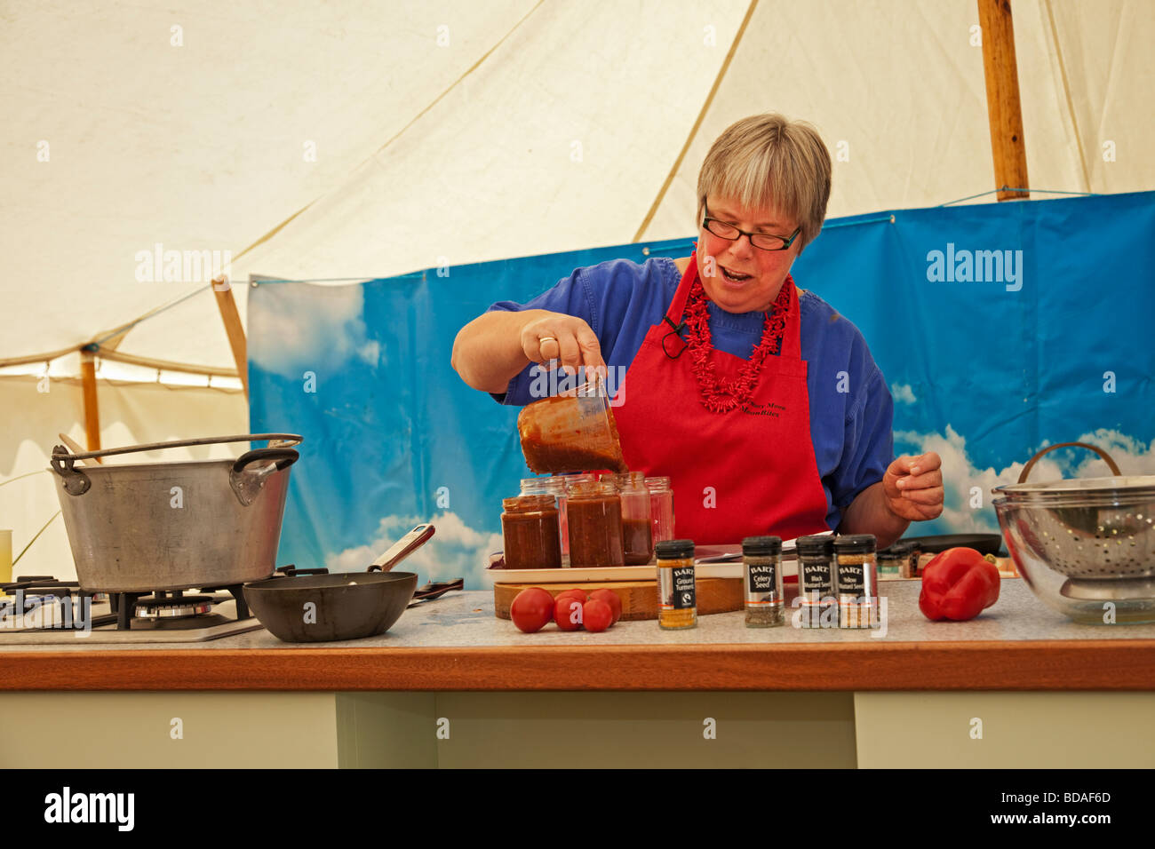 A pickling demonstration by Rosemary Moon at the Chilli Fiesta, West Dean Gardens, West Sussex, England, UK. Stock Photo