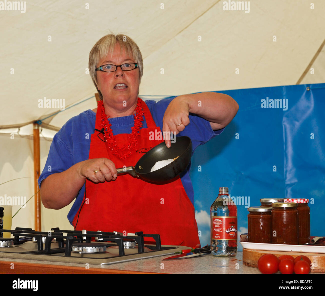 A pickling demonstration by Rosemary Moon at the Chilli Fiesta, West Dean Gardens, West Sussex, England, UK. Stock Photo