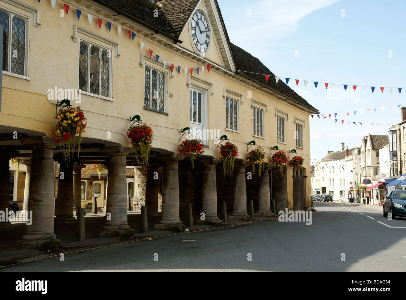 Tetbury Market Hall with hanging flower baskets Stock Photo
