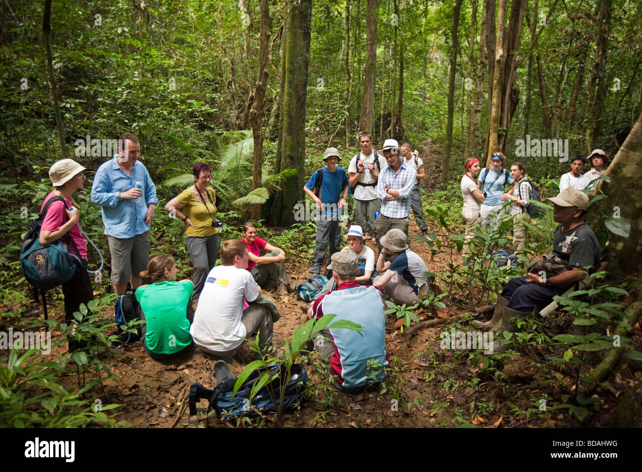 Indonesia Sulawesi Operation Wallacea sixth form students resting during forest walk Stock Photo