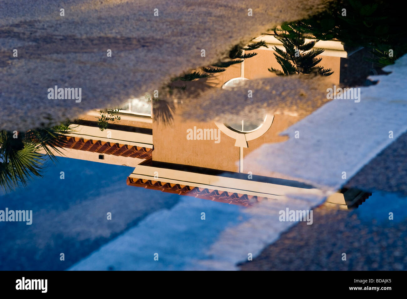 Puddle of water in a parking lot hi-res stock photography and images ...