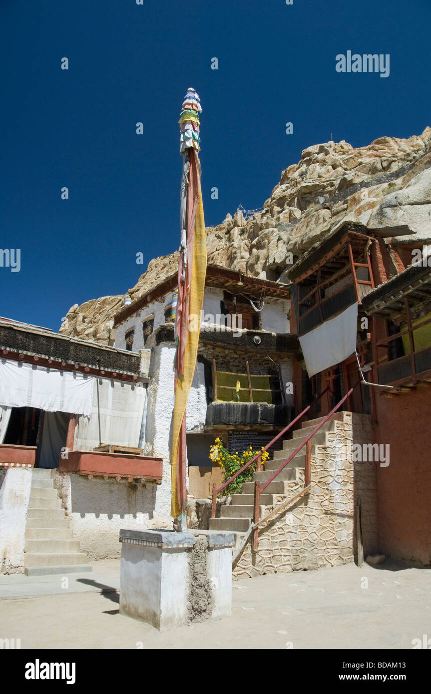 Prayer flag in front of a monastery, Tak Thog Monastery, Ladakh, Jammu and Kashmir, India Stock Photo
