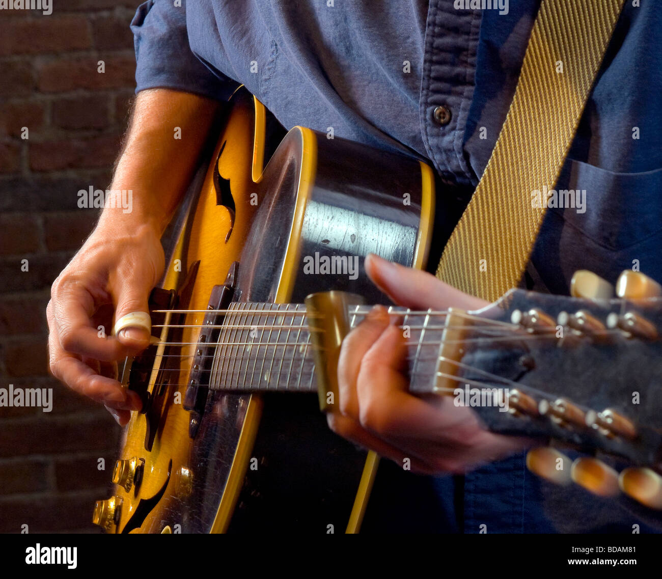 Playing electric guitar inside hi-res stock photography and images - Alamy
