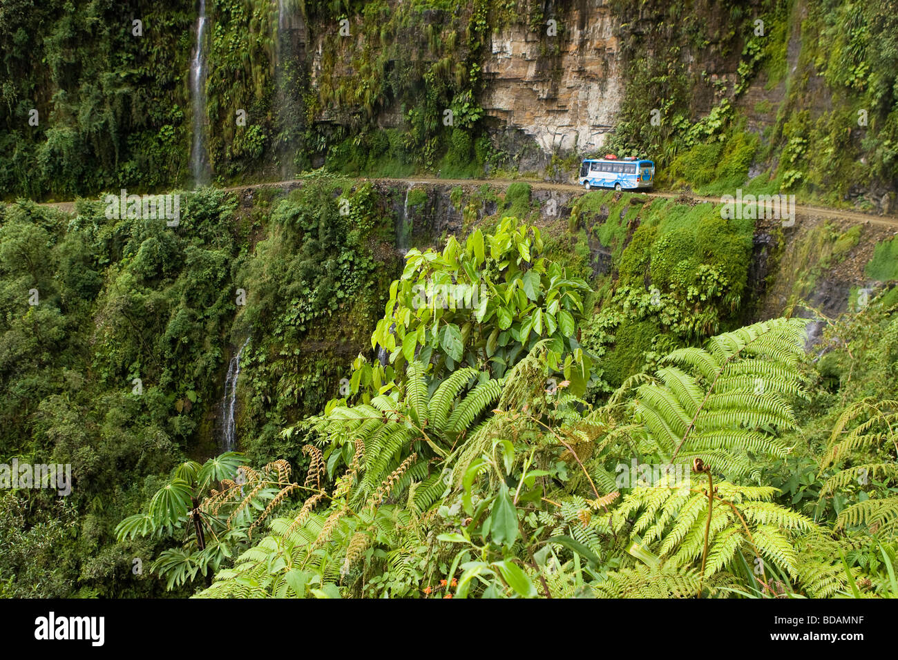 Vehicle traveling the road from La Paz to Coroico, Bolivia. Stock Photo