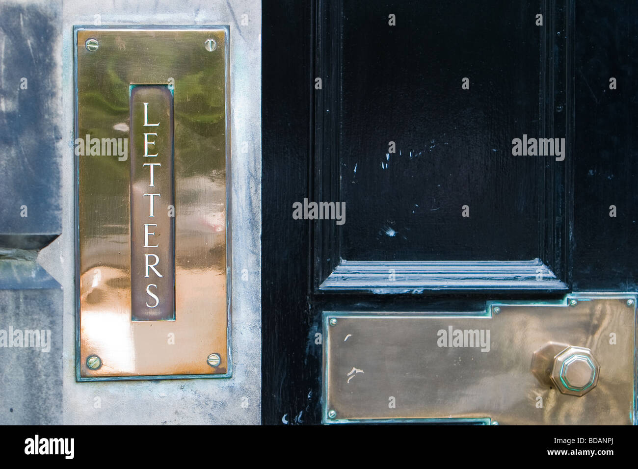 A door with brass letterbox and handle Stock Photo Alamy