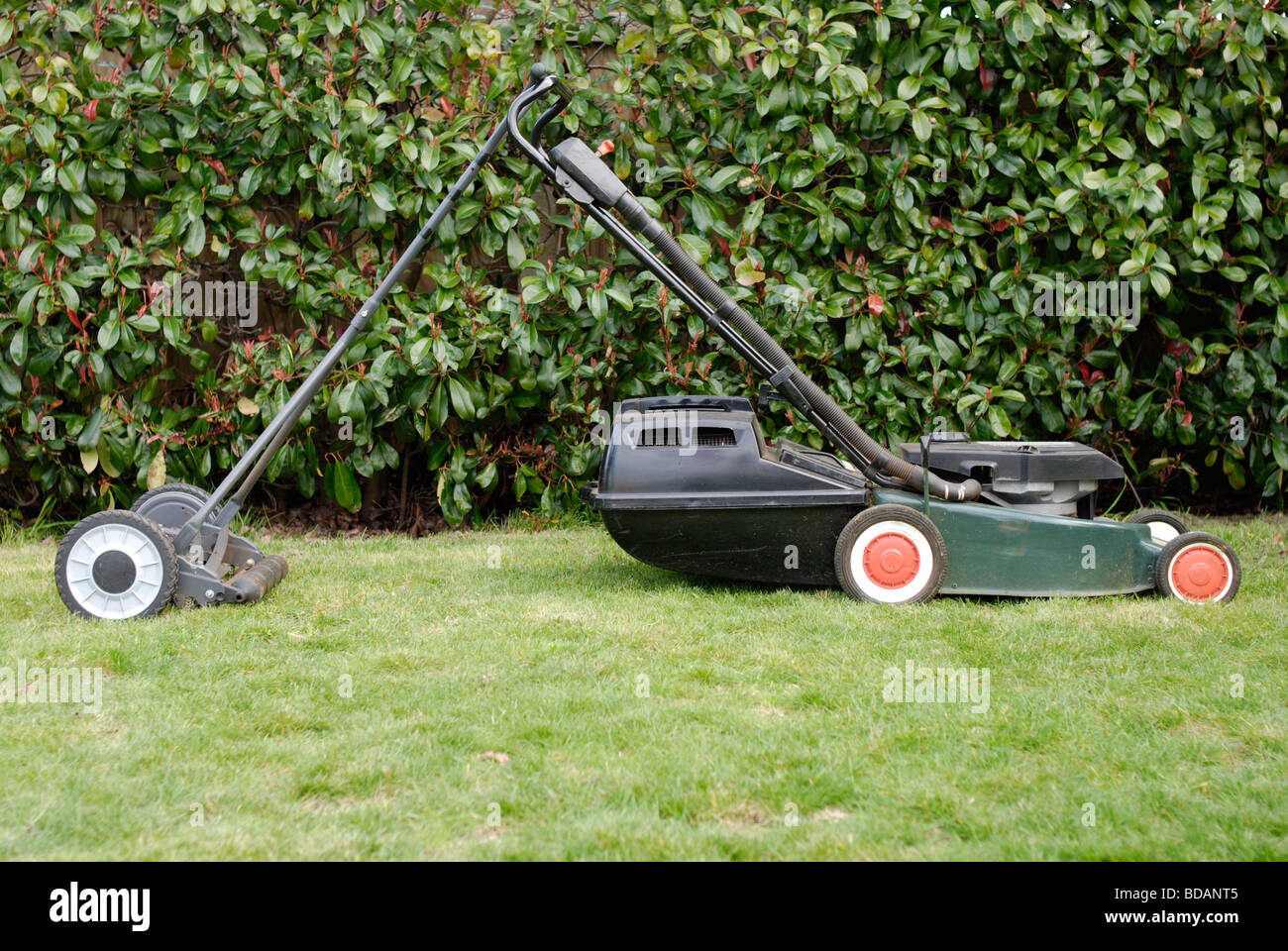 A pollution free push mower offers a sustainable alternative to a petrol mower Stock Photo