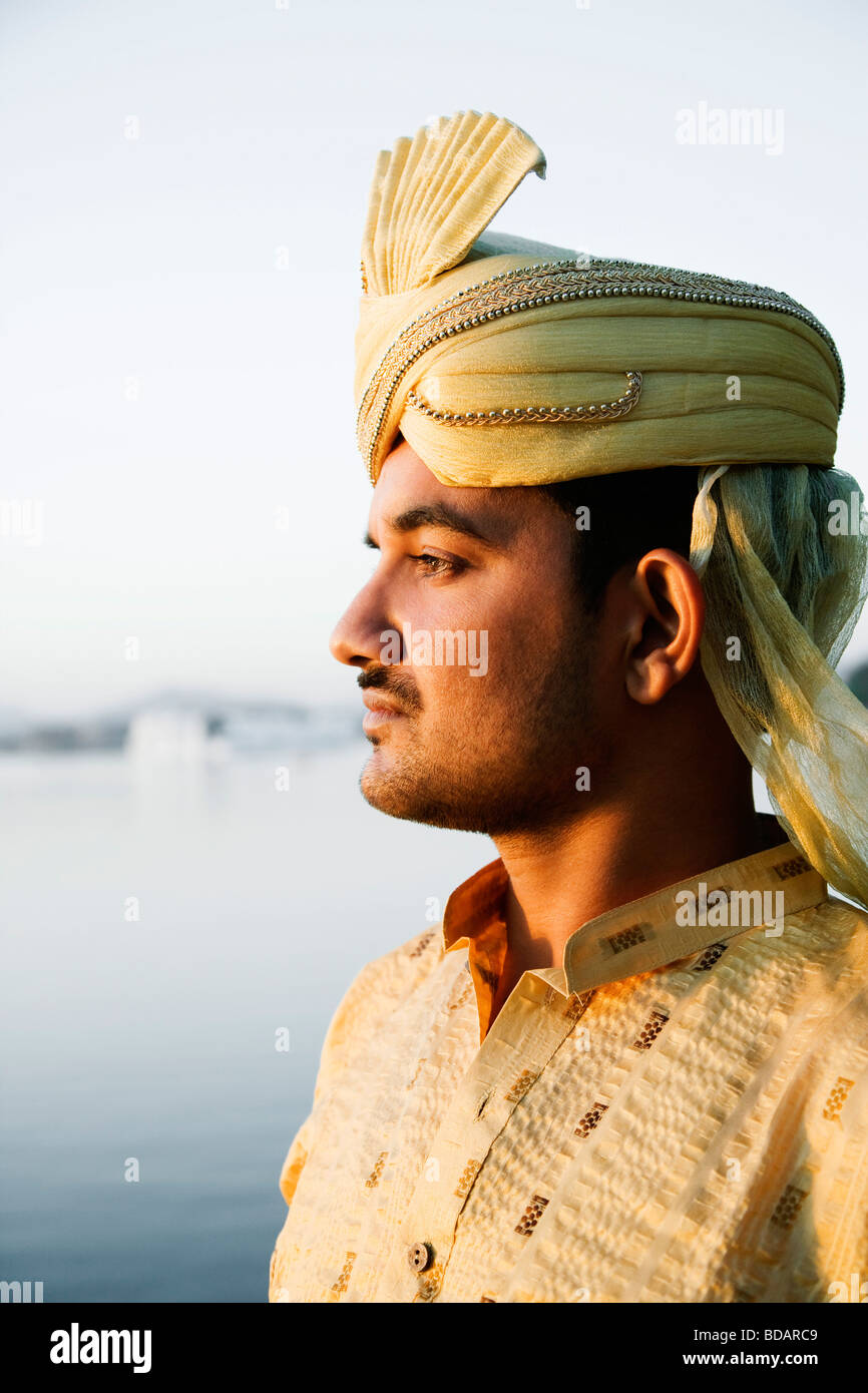 Side profile of a groom thinking, Udaipur, Rajasthan, India Stock Photo