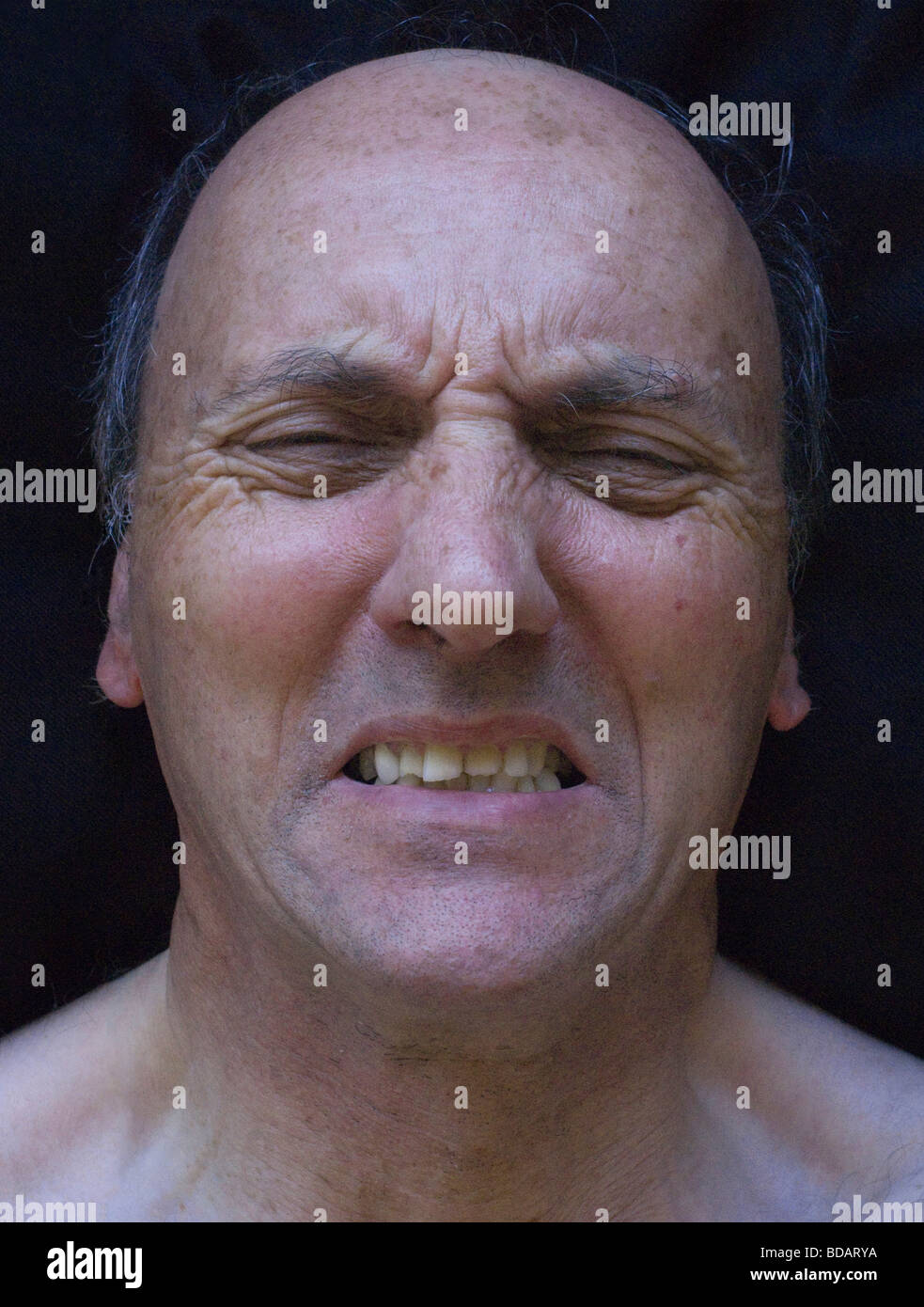 A middle-aged man showing stress, tension and depression Stock Photo