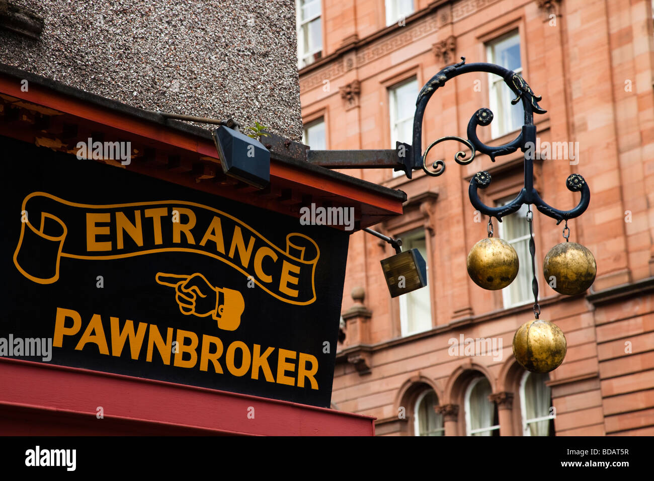 Pawnbrokers sign and notice outside shop, Glasgow, Scotland, UK, Great Britain Stock Photo