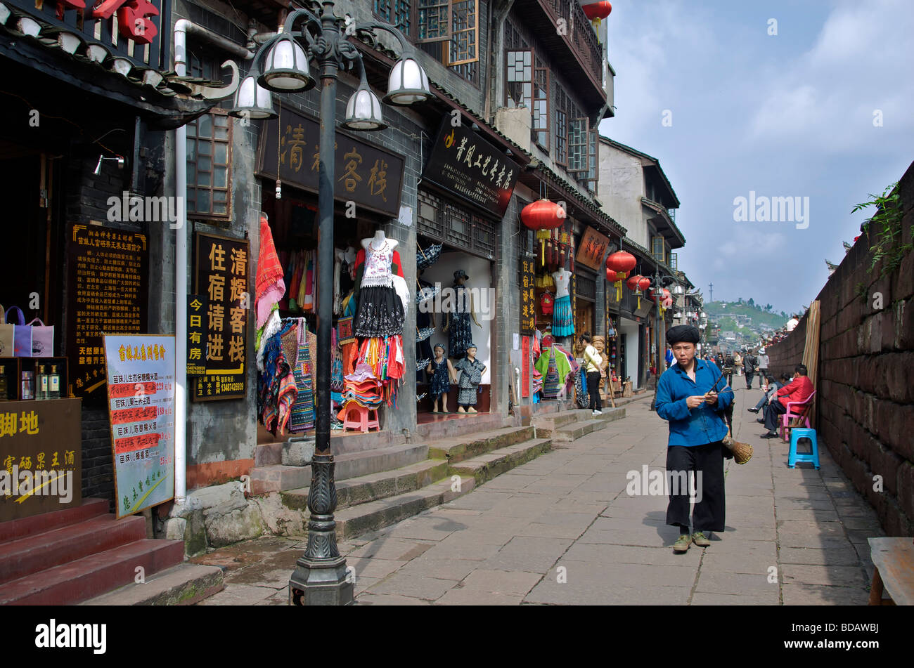 Shops and city wall Biaying street Ancient Town of Fenghuang Hunan China Stock Photo