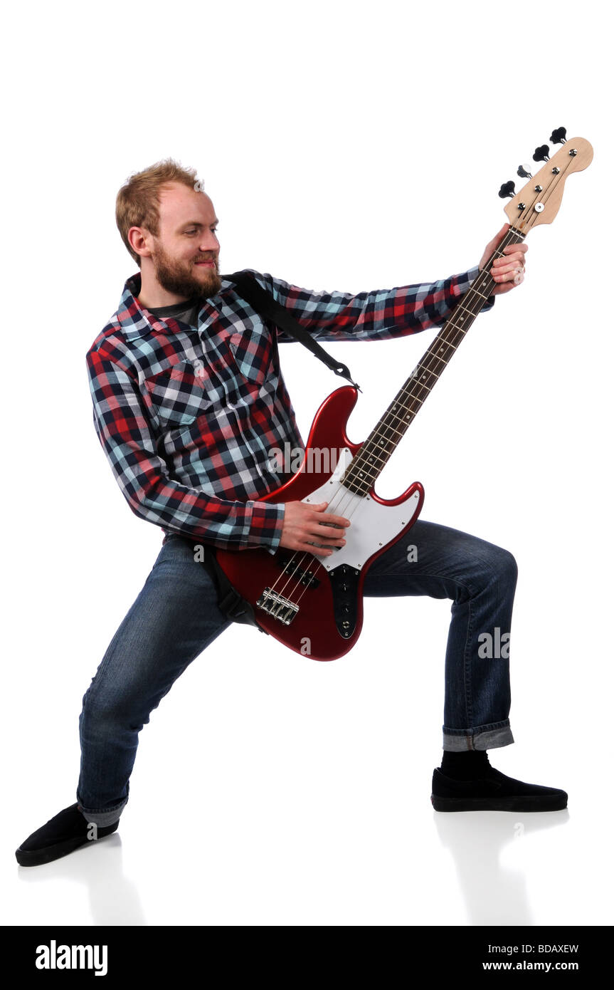 Young man playing bass guitar isolated over white background Stock Photo