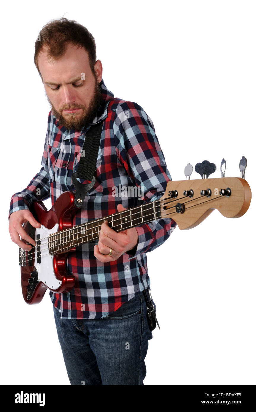 Man playing base guitar isolated over white background Stock Photo