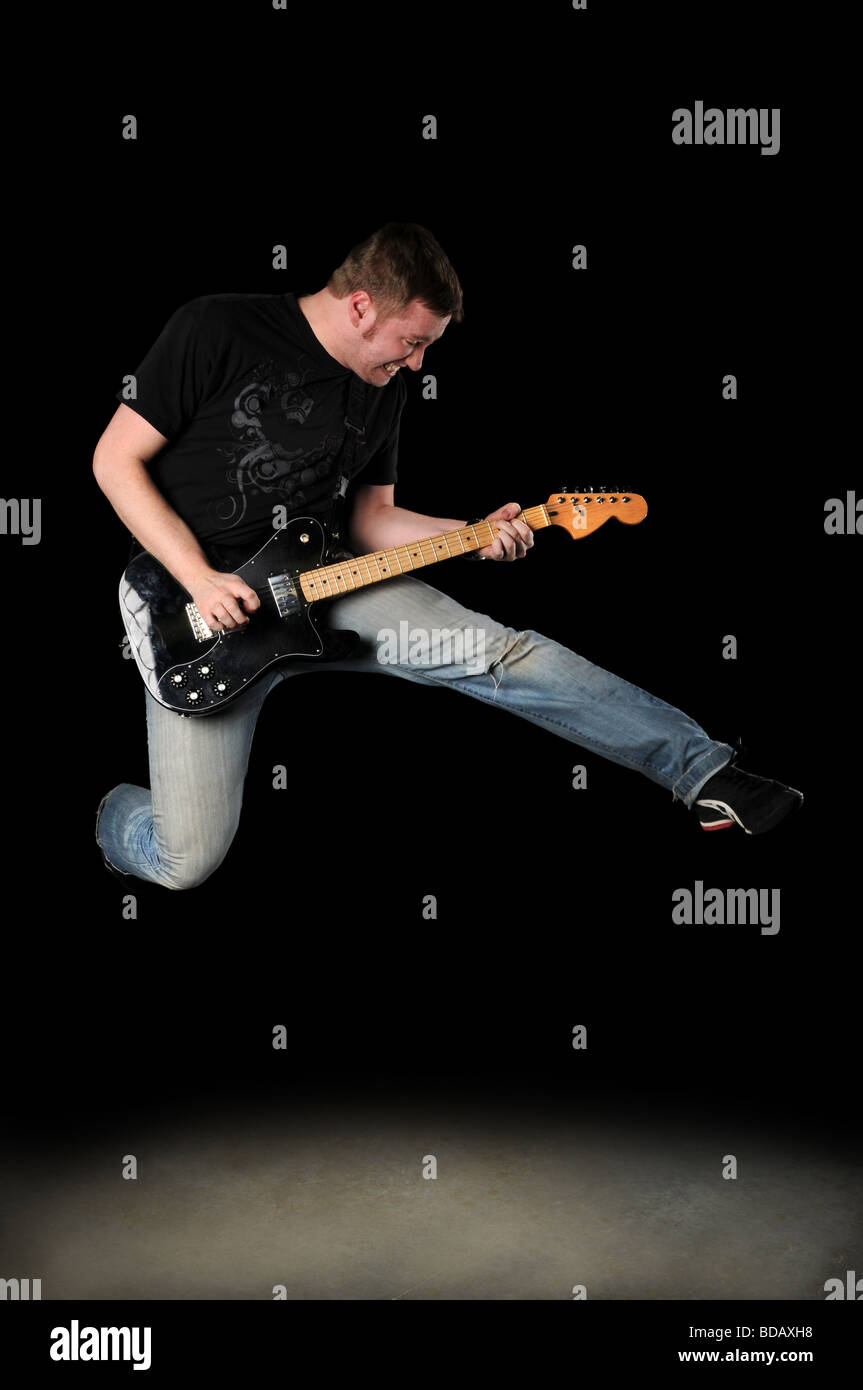 Guitar player jumping hires stock photography and images Alamy